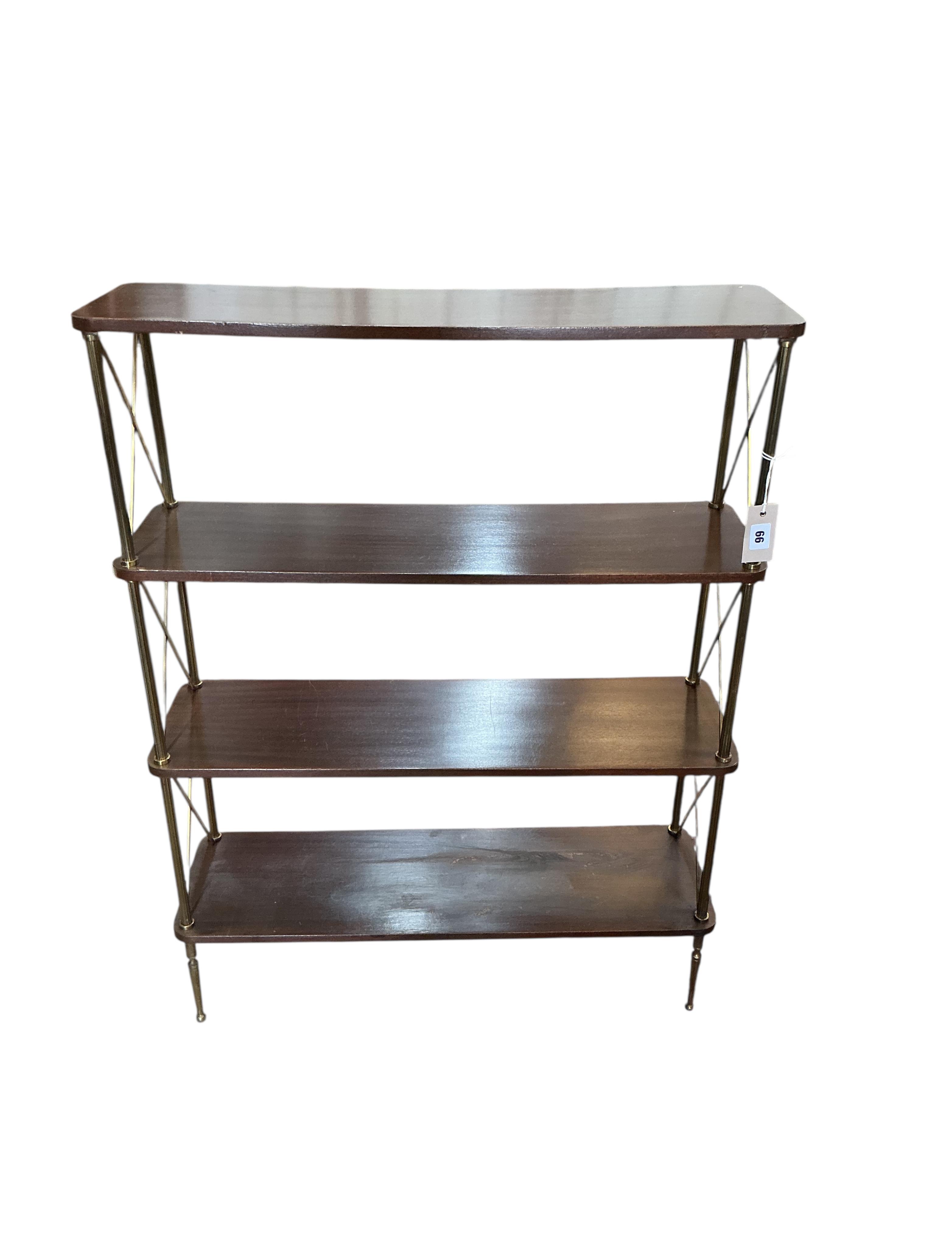 A Maison Jansen style mahogany and brass four tier open bookcase, width 75cm, depth 23cm, height 99cm